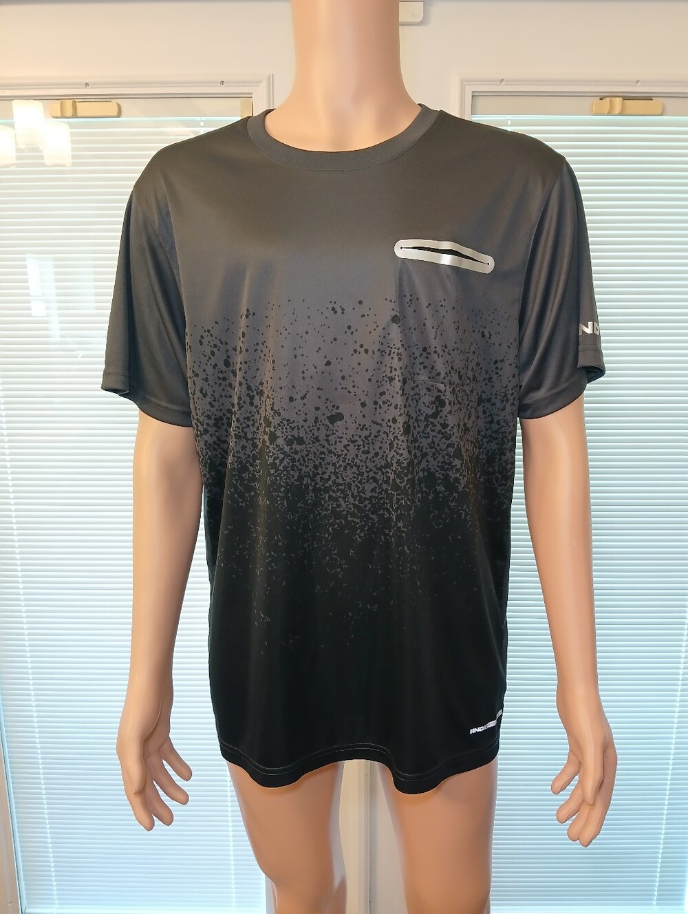 And1 Black Short Sleeve Performance Tee with Subtle Splatter Graphic